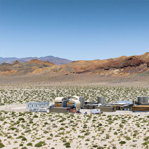 Lithium expert woman in yellow raincoat